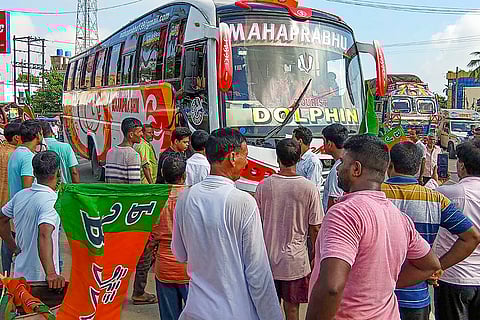 BJP's Bengal Bandh: BJP workers stop a bus on National Highway 12 during the party's 12-hour general strike in Malda